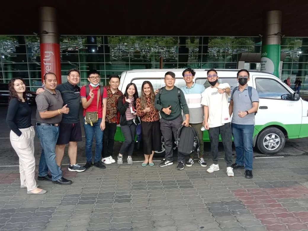 Happy customers with our rental van at Kuching Airport